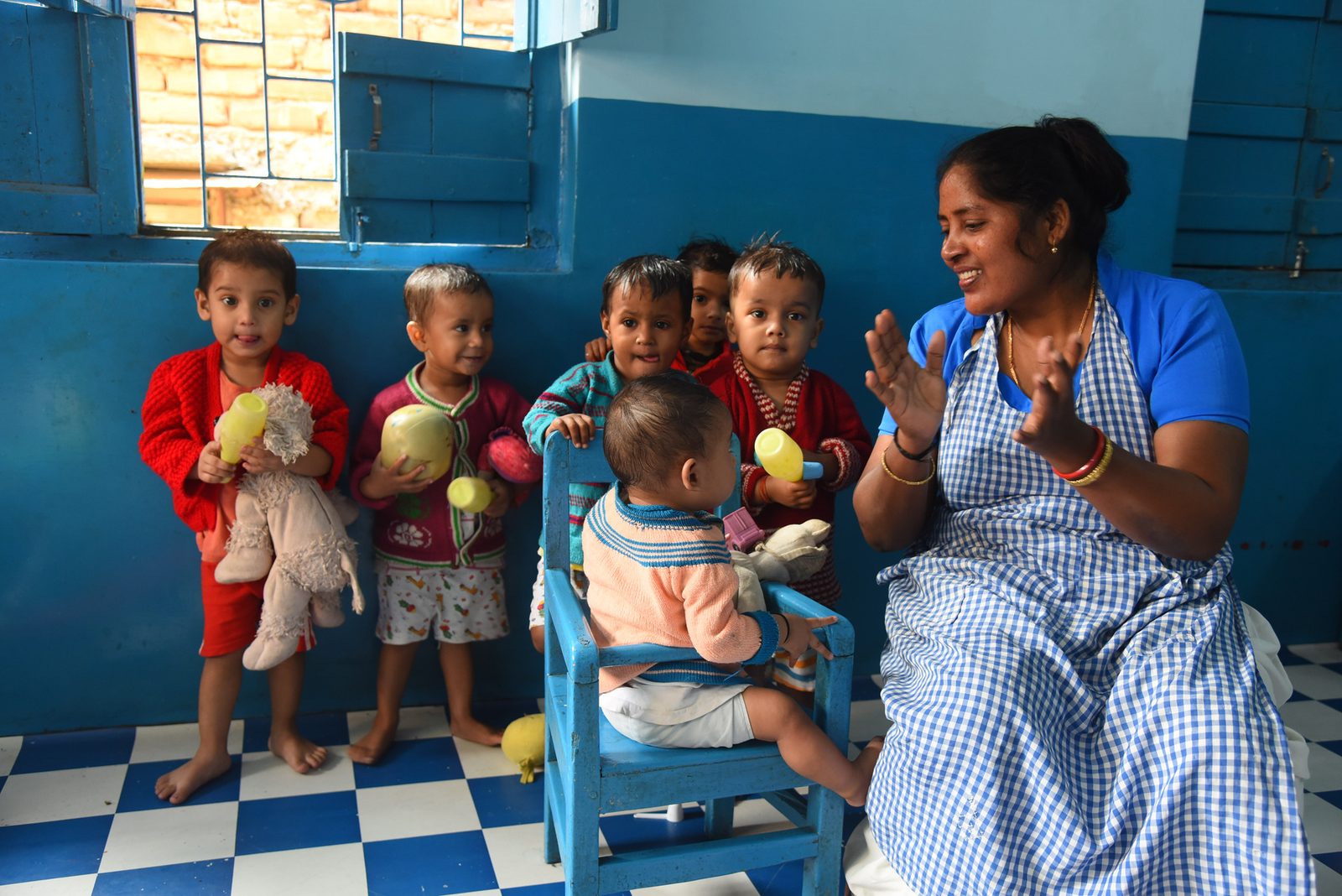 Babies being cared for in the crèche at Pilkhana