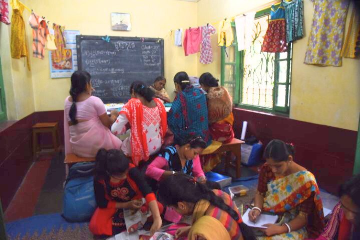 Women learning tailoring and embroidery at Baniniketan Education Centre